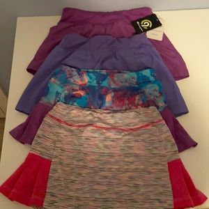 4 Skorts, 7/8 Champion, never worn